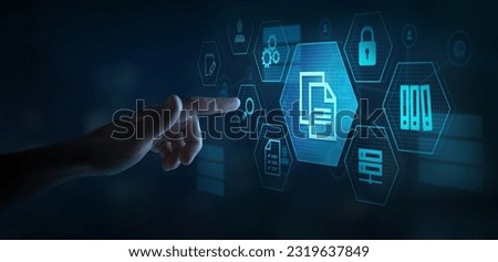 document management or ERP concept with icons on virtual screen, digital documents Royalty-Free Stock Photo #2319637849