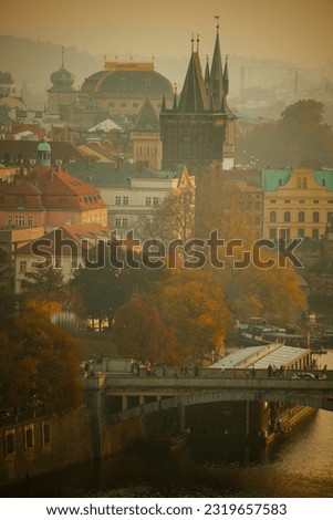 landscape with Old Town Bridge Tower in the evening in autumn in Prague, Czech Republic.