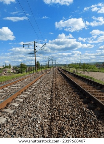 pictures of railway tracks with landscape background