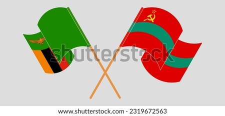 Crossed and waving flags of Zambia and Transnistria. Vector illustration
