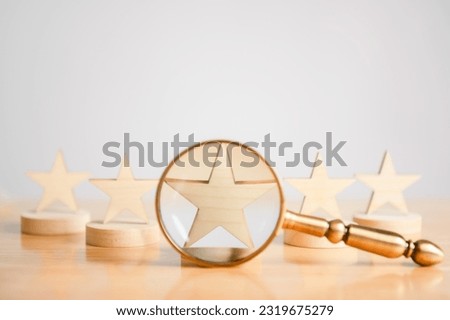 Customer service excellent rating satisfaction survey magnifying glass on five stars symbol. Business focus evaluation product review concept. Score user experience feedback voting guarantee opinion Royalty-Free Stock Photo #2319675279