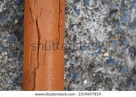 The water pipe is broken and there is rust on it, close-up photo except copy space.