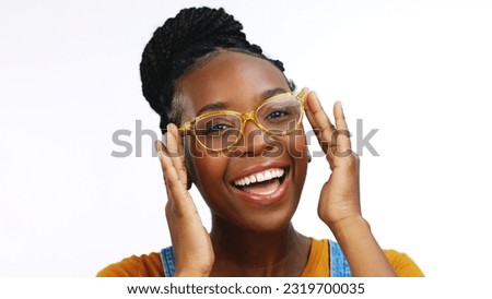 Portrait, African American female and lady with eyewear, smart or confident with spectacles. Face, black woman and glasses for clear vision, excited and happy girl isolated on white studio background Royalty-Free Stock Photo #2319700035