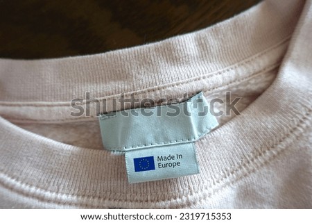 "Made in Europe" Label of T-Shirts. Royalty-Free Stock Photo #2319715353