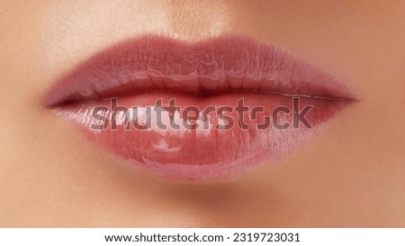 Woman lips skin care. Hydration. Hyaluronic acid. Lip protection balm. Hygienic lipstick Royalty-Free Stock Photo #2319723031