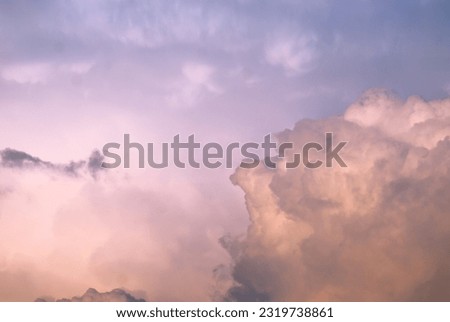 Curly white-pink sunset clouds. Sky background. 
Conceptual photo: paradise, divine abode, religion, christianity, faith, God. Higher than clouds.