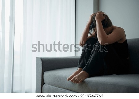 Mental health problem, Sad asian female anxiety depressed lonely in his home.
 Royalty-Free Stock Photo #2319746763