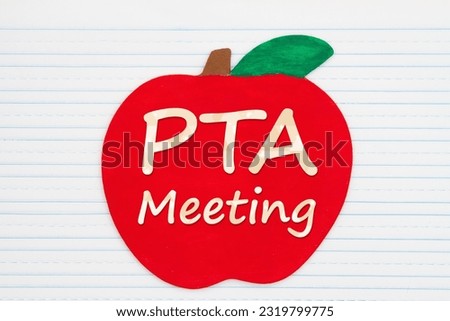 PTA meeting message on a wooden apple on vintage ruled line notebook paper for you education or school message Royalty-Free Stock Photo #2319799775