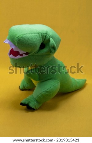 Photo of a cute dinosaur plush toy