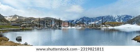 Spring alps mountain lake Lago della Piazza (Switzerland, Passo del San Gottardo) Royalty-Free Stock Photo #2319821811