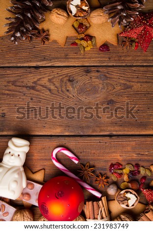 chocolate with hazelnuts on a wooden background