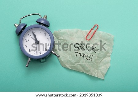 Quick Tips text on a blue background with alarm clock