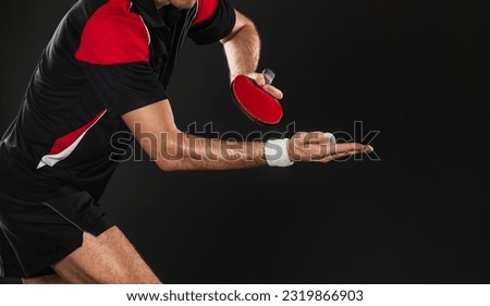 Table tennis player. Ping pong closeup banner. Download a photo of a table tennis player for a tennis racket packaging design. Image for tennis ball box template.