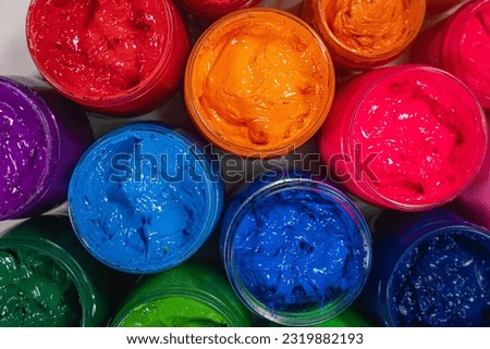 Top view various colors for shirt printing packed in glass bottles.
bright colors.Flashy paint. Fabric printing ink lined up.
colorful colors background. Royalty-Free Stock Photo #2319882193