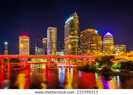 The skyline and bridges over the Hillsborough River at night in Tampa, Florida.