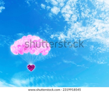 Pink heart shaped diamonds and pink balloons, bright sky background, valentines day concept