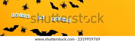 Banner Trick or treat inscription. Flat lay halloween. The bats
