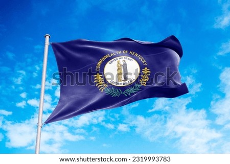 Kentucky flag waving in the wind, blue sky background