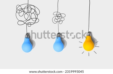 Clarifying complex ideas through the glow of lightbulbs - Flat lay