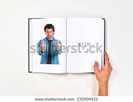 Man making horn gesture printed on book