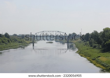 A river, river bridge, sky