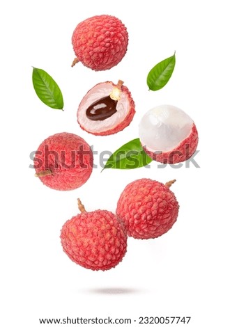 Lychee fruit flying in the air isolated on white background Royalty-Free Stock Photo #2320057747