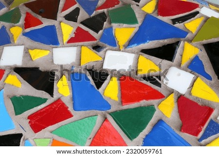 Vintage colorful mosaic background. Mosaic pattern close up in retro style. Colorful polygons background.