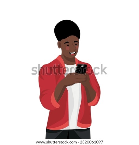 Young African-American man with mobile phone on white background