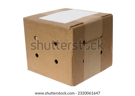 Shipping Box. Cardboard box. Isolated on white. Live Animals. Shipping Crate. Package in the mail. Animal Crate. Composite cardboard box. Closed cardboard box taped up and isolated on white. Gift.
