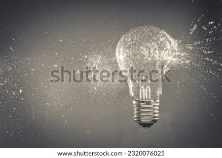 explosion of a traditional glass bulb Royalty-Free Stock Photo #2320076025