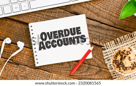 Word Overdue Accounts in an office notebook. Royalty-Free Stock Photo #2320081565