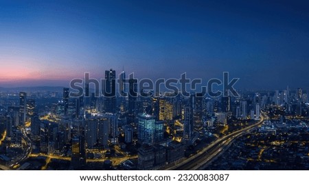 Aerial view of peaceful cityscape before sunrise Royalty-Free Stock Photo #2320083087