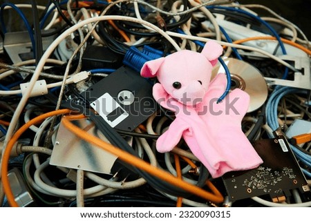 Heap of isolated electrical cable residues. confusion concept with doll