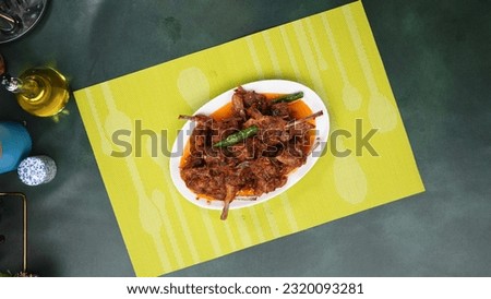 Amazing Picture of mutton karahi with professional decor