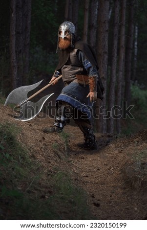 Fantasy medieval red-haired gnome warrior with beard with huge ax halberd in forest.