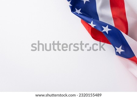American federal holiday concept. High angle view photo of the flag of United States of America in the right corner on white isolated background with copy-space