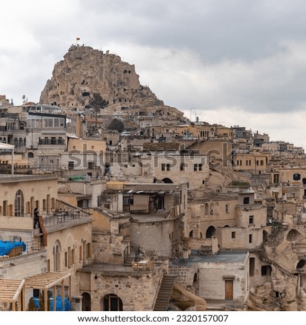 A picture of the Uchisar town in Cappadocia on a cloudy day.