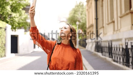 Bad, signal and phone call by asian woman walking in a city with internet, delay or glitch. Poor, connection and female worker searching for reception on smartphone with issue, problem or tech error Royalty-Free Stock Photo #2320161395