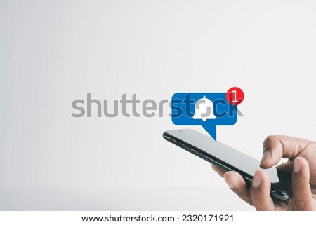 Reminder,digital marketing,Email notification,New message,Reminder notification,Social Media,business concept.,New Reminder or New  bell ringing icon on smartphone over white background. Royalty-Free Stock Photo #2320171921