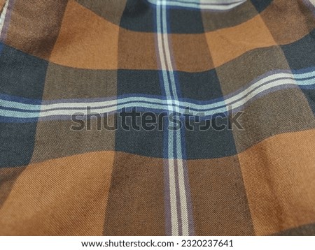 Black and brown flanel, pants, sarong textile pattern