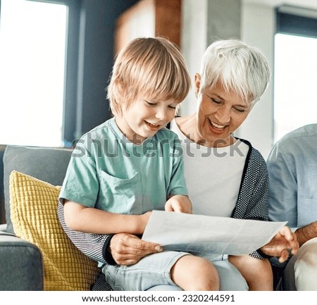 Portrait of grandparents and grandchildren having fun together at home Royalty-Free Stock Photo #2320244591