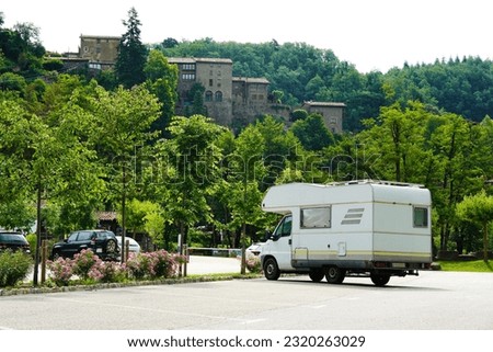 Motor home parked in Rupit, Osona. Stone houses on top of the green mountain. Family trip to villages in Catalunya. 
 Royalty-Free Stock Photo #2320263029
