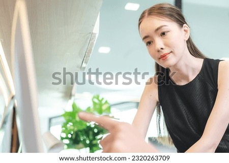 Professional businesswoman entrepreneur concept, Asian woman freelance using laptop computer to working with online internet technology communication, female business person job work in modern office