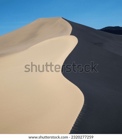 Sinusoidal dune ridge- Eureka Dunes, Death Valley National Park Royalty-Free Stock Photo #2320277259