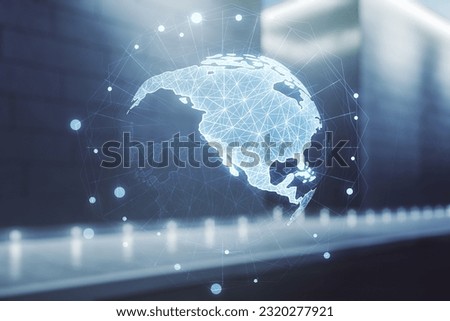 Virtual digital map of North America on blurry modern office building background, international trading concept. Multiexposure Royalty-Free Stock Photo #2320277921