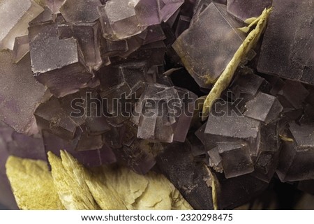 fluorite, violet macro detail, texture background. close-up, semi-precious gemstone Royalty-Free Stock Photo #2320298475