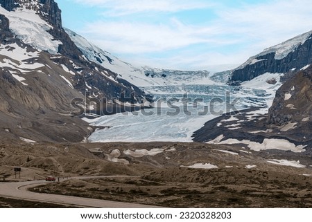 Athabasca Glacier on the Columbia icefields in Canada is quickly receding due to global warming. Royalty-Free Stock Photo #2320328203