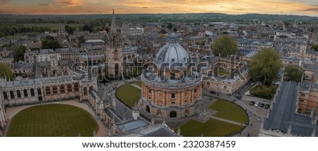 Aerial view of the Oxford city, UK. Beautiful medieval city with many castles and traditional English buildings.  Royalty-Free Stock Photo #2320387459