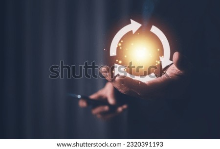 hand holding circular economy icons concept of eternity There is no end and there is no limit. Royalty-Free Stock Photo #2320391193