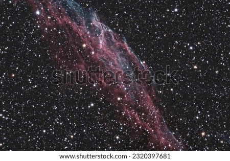 Part of the Veil Nebula (NGC 6992) a supernova remnant. Cloud of heated and ionized gas and dust in the constellation Cygnus. Long exposure, star map